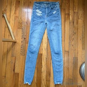 American Eagle Outfitters Light Blue Distressed Skinny Jeans